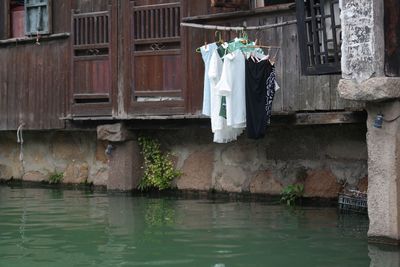 Clothes drying against built structure