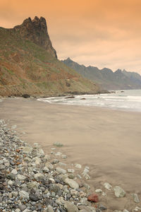 Scenic view of sea at sunset