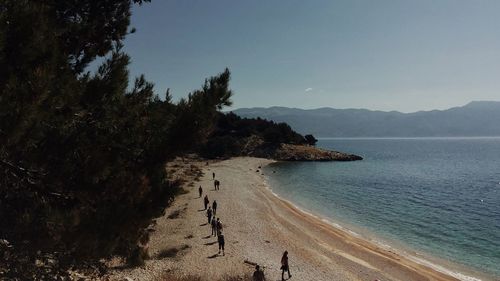 Scenic view of beach against clear sky