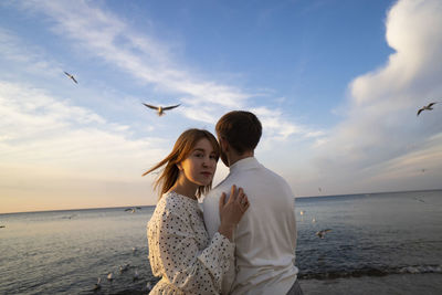 Kaliningrad, russia. young couple in love on the seaside