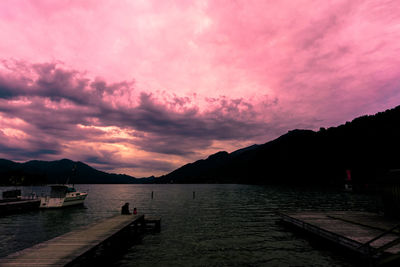 Scenic view of silhouette mountains against sky at sunset