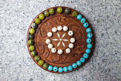 Directly above shot of multi colored candies in plate