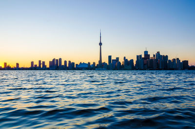 View of skyscrapers at sunset