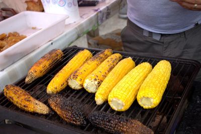 High angle view of meat on barbecue grill