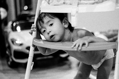 Portrait of cute boy sitting