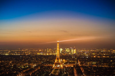 High angle view of illuminated city at night