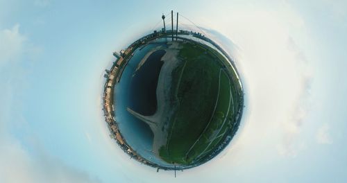 Digital composite image of building against sky