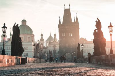 Panoramic view of buildings in city against sky