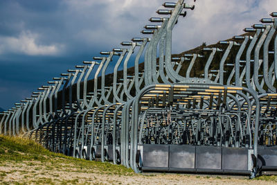 Metallic structure against sky