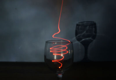 Close-up of wine glass on table