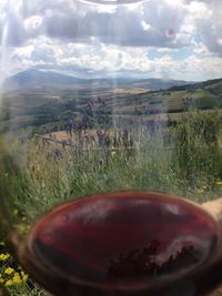 View of landscape against cloudy sky