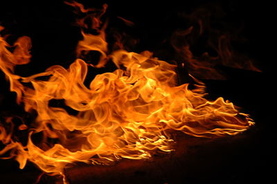 Close-up of fire crackers over black background