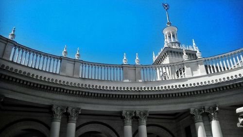 Low angle view of building against blue sky