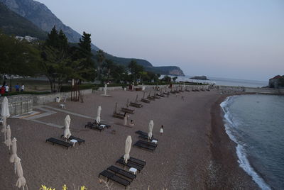 Panoramic view of beach against clear sky