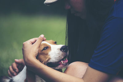 Midsection of woman with dog