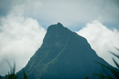 Low angle view of mountain range against sky