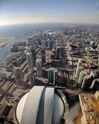 High angle view of city buildings against sky