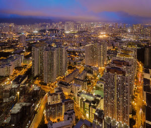 Aerial view of illuminated buildings at night