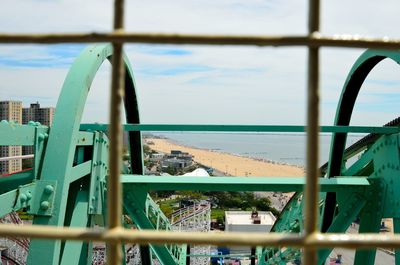 High angle view of beach seen through ferris wheel