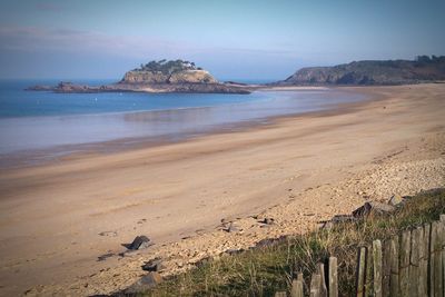 Scenic view of beach against sky