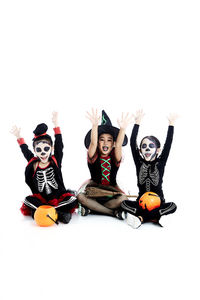 Children playing with toy against white background
