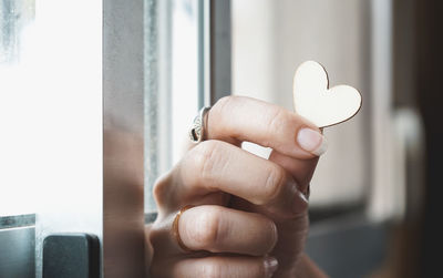 Close-up of hand holding pills