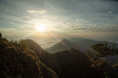 Scenic view of mountains against sky during sunset