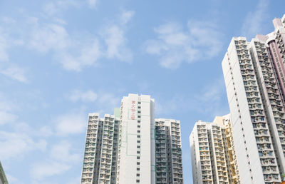 Low angle view of modern buildings against sky