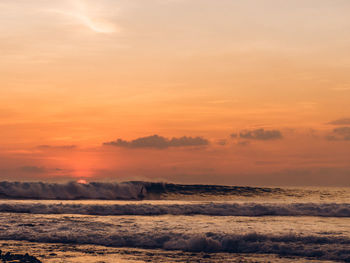 Scenic view of sea at sunset