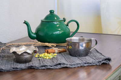 Close-up of tea cup on table