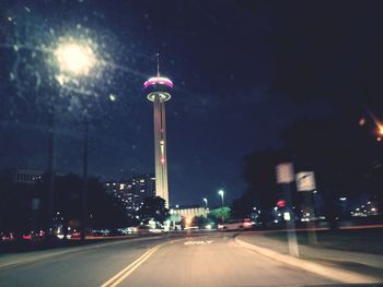 View of city lit up at night