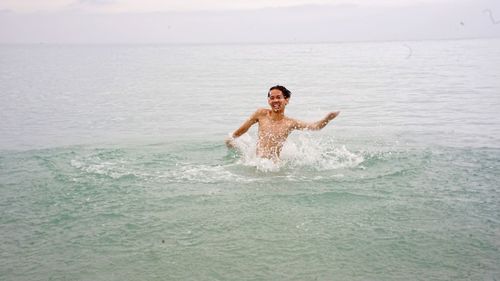 Portrait of woman in sea