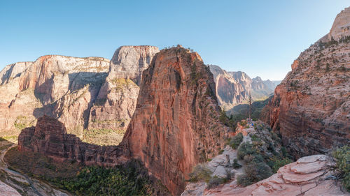 Scenic view of rocky mountains against clear sky