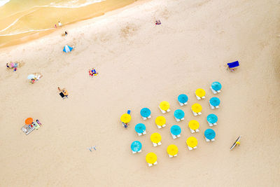 High angle view of toys on beach