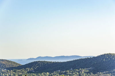 Scenic view of mountains against clear sky