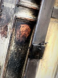 High angle view of old rusty door