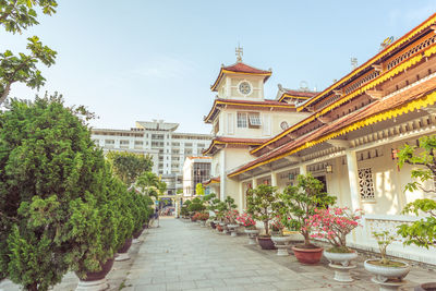 View of buildings against cloudy sky