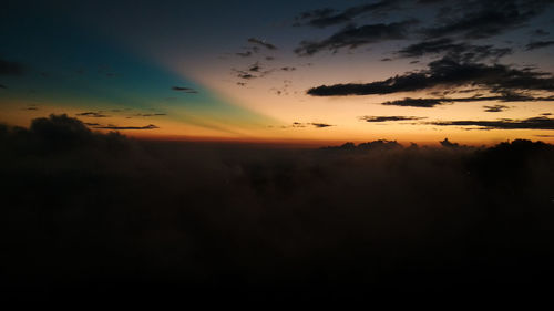 Scenic view of dramatic sky during sunset