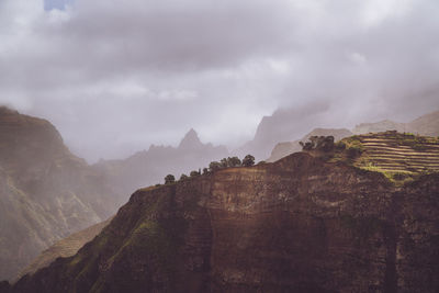 Scenery with shape of huge rocks and motion clouds mist on sky. santo antao cape verde