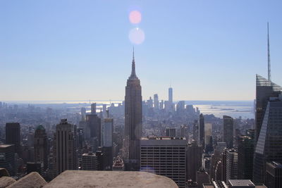 Modern buildings in city against sky