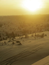 Scenic view of landscape against sky during sunset