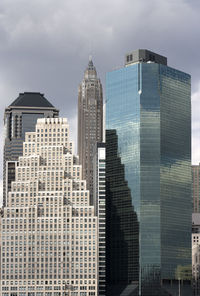 Low angle view of modern buildings against sky