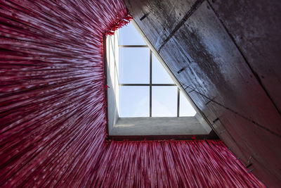 Low angle view of glass window ceiling 