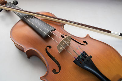 High angle view of violin on white background