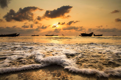 Scenic view of sea at sunset