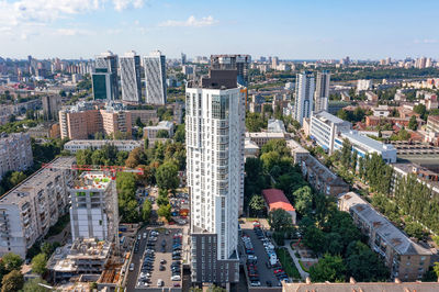 Aerial photography, construction of new high-rise residential complexes among the low buildings.