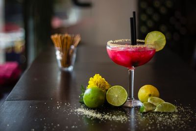 Cocktail with cinnamon and lime
