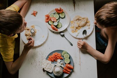 High angle view of people having food