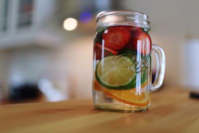 Close-up of drink in glass jar on table