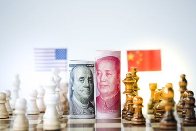 Close-up of chess pieces on table